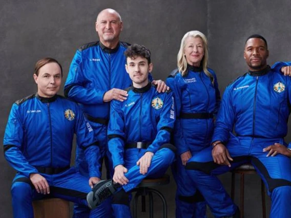5 people  in space suits
