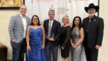 Six people accept an award.